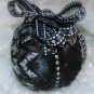 Unique handmade quilted black and silver ornament