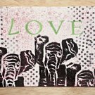 Whimsical letterpressed LOVE card with original stamped handcarved elephant