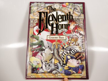 The Eleventh Hour by Graeme Base Hardcover 1989 Dust Jacket Sealed Solution Rare