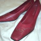 WOMENS 9.5 RED LEATHER PUMPS WITH SILVER GROMMETS GUC