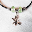 Dragonfly on bail charm necklace w/white & green murano glass beads on black leather cord