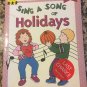 Sing a Song of Holidays (Learn With Piggyback) [paperback] Lustig, Jill,Warren, Jean,Burris
