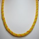 25 Inch Yellow And Orange Spiral Wowen Beded Necklace