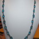 31 Inch Blue Oval Glass Beads Accented With Silvertone Spaces And Bead Tips