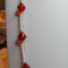 32 Inch White Seed Bead Necklace With Red Bicones