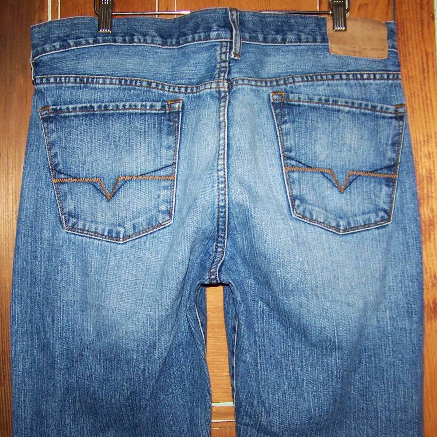 mens guess jeans with triangle