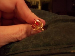 Garnet Swirled In Gold Ring