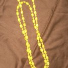 Single strand of Yellow Beads