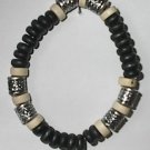 Black and white wood bead bracelet with silver accents