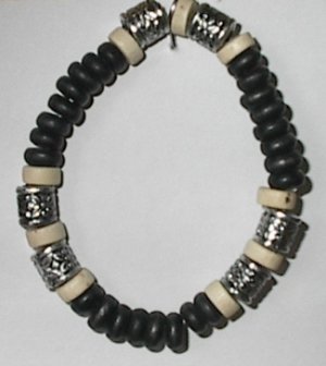 Black and white wood bead bracelet with silver accents