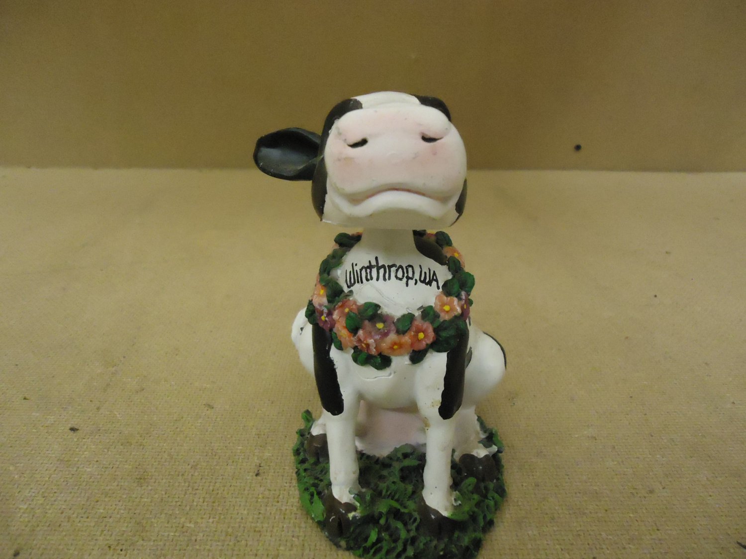 Topline Products Inc. Figurine Black/White/Green Bobbin Friend Cow