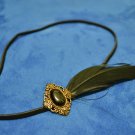 Black feather with stone design hair band