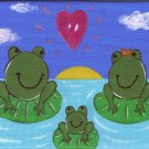 Happy Family Of Frogs
