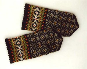 Hand knitted warm wool mittens , gloves patterned with different splendid nature colors