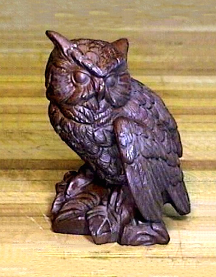 wooden owl figurine