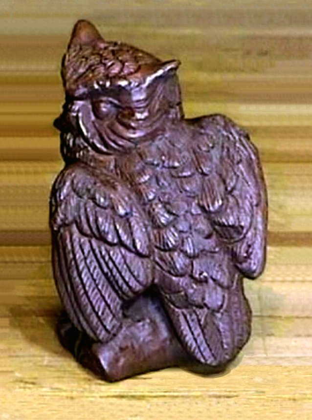 small wooden owl figurines