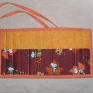 Hand Crafted Snoopy Crayon Holder Roll Up with Orange Tie