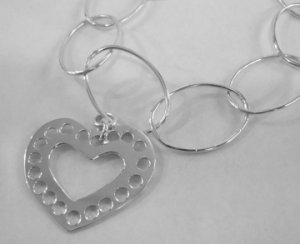 Mexican Sterling Silver 925 Silver Pendant Heart with circles.