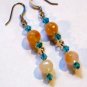 Orange and aquamarine artisan earrings dangle from surgical steel  earwires ID AA102