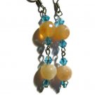 Orange and aquamarine artisan earrings dangle from surgical steel  earwires ID AA102