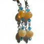 Orange and aquamarine artisan earrings dangle from surgical steel  earwires ID AA102