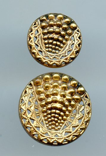 2 small antique pierced brass buttons