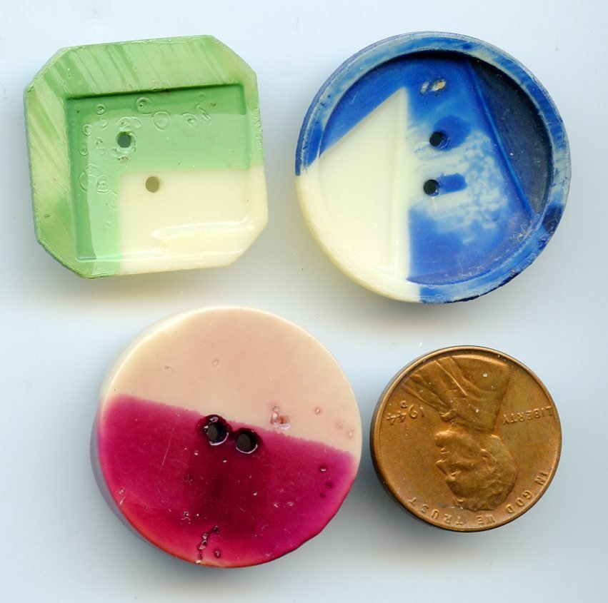 3 medium size colorful celluloid ,buttons