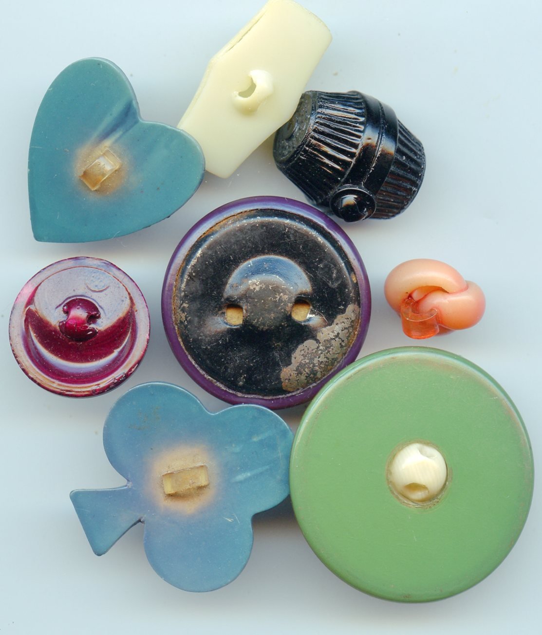 group of 8 celluloid buttons