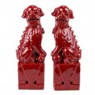 A pair of red sculpture ceramic poodles animals for living room