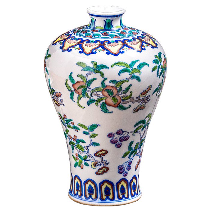 Vintage chinese blue and white ceramic vase with flowers and fruits