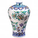 Vintage chinese blue and white ceramic vase with flowers and fruits Vintage chinese blue and white ceramic vase with flowers and fruits