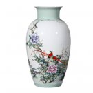 Designer pastel ceramic vases and ornaments with birds and flowers