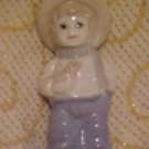 CHARMING PORCELAIN BOY WITH BIRD FIGURINE CHARMING PORCELAIN BOY WITH BIRD FIGURINE