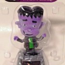 Solar Purple Frankenstein Monster Figurine Wiggles In Sunlight