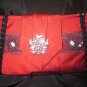 Solid Red Silk Tie Purse, black and silver trim and silver broach