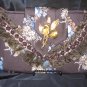 Brown floral Printed Tie Purse with brown lace and trime. Antique gold broach.