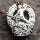 East German Soldier with Rifle & Throwing Grenade DDR Flag Germany Pin Silver