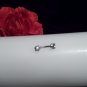 Clear eyebrow curve piercing with rhinestones 18G