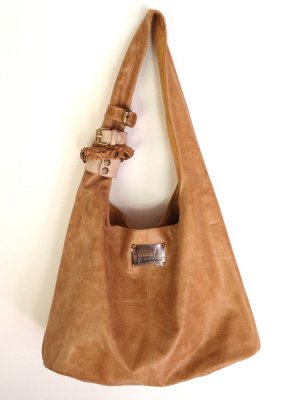 Serendipity leather bag with cuffs hand made in Bali by ELF.