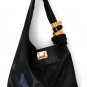 Serendipity leather bag with cuffs hand made in Bali by ELF.