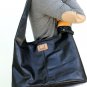 Serendipity leather bag with cuffs hand made in Bali by ELF.