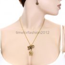 FASHION NECKLACE, EARRING SET SUPER CHIC AND SEXY GOLD CHAIN WITH CHERUB AND HEART MULTI PENDANT