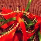 Green,white and red ponytail holder