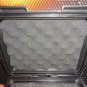 Invicta watch carrying case in black with grey handles holds 3 watches