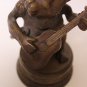 Monkey playing Guitar made of Brass