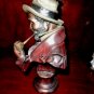 bronze pipe smoker sculpture