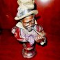 bronze pipe smoker sculpture