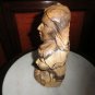 statue bust of man and women