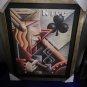 print signed and framed in black frame. new