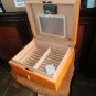 Brizard Airflow Humidor in Racing Orange Leather Measures 14" L x 12" W x 5" H